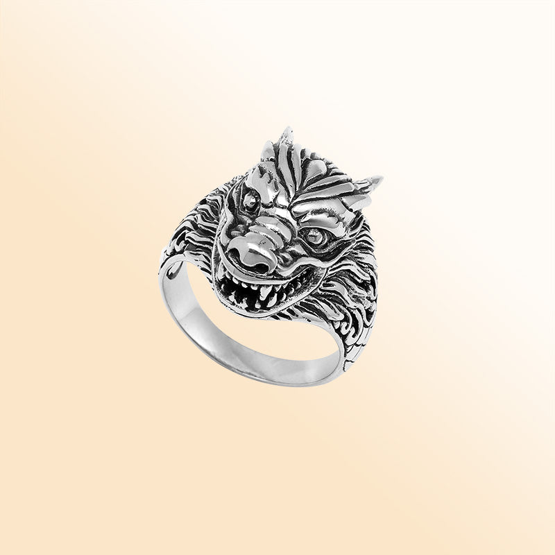 Handcrafted sterling silver dragon head statement ring with detailed Balinese carvings and oxidized finish – bold mythical artisan jewelry for men and women.