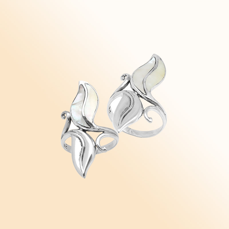 Handcrafted sterling silver leaf ring with luminous Mother Of Pearl inlay – elegant boho Balinese jewelry for women.