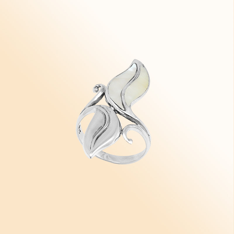 Handcrafted sterling silver leaf ring with luminous Mother Of Pearl inlay – elegant boho Balinese jewelry for women.