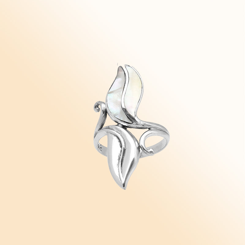 Handcrafted sterling silver leaf ring with luminous Mother Of Pearl inlay – elegant boho Balinese jewelry for women.
