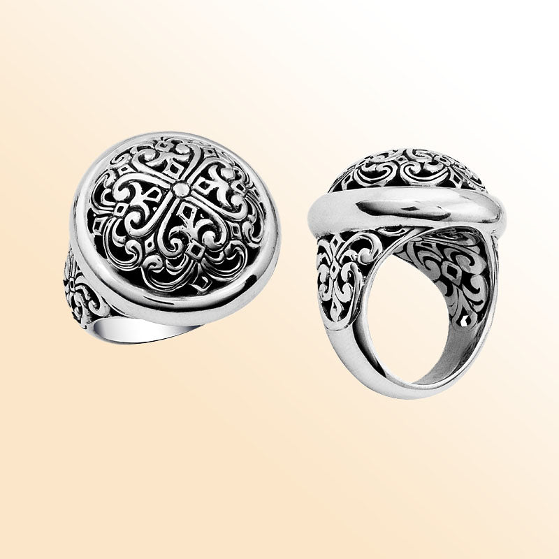 Sterling silver domed ring with intricate Bali carving, bold artisan statement jewelry for women.