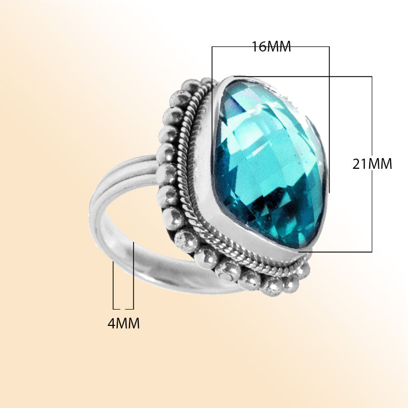 Sterling silver ring with sparkling cushion-cut blue Topaz Quartz, detailed rope bezel and beaded frame, handcrafted for elegant everyday or special occasion wear