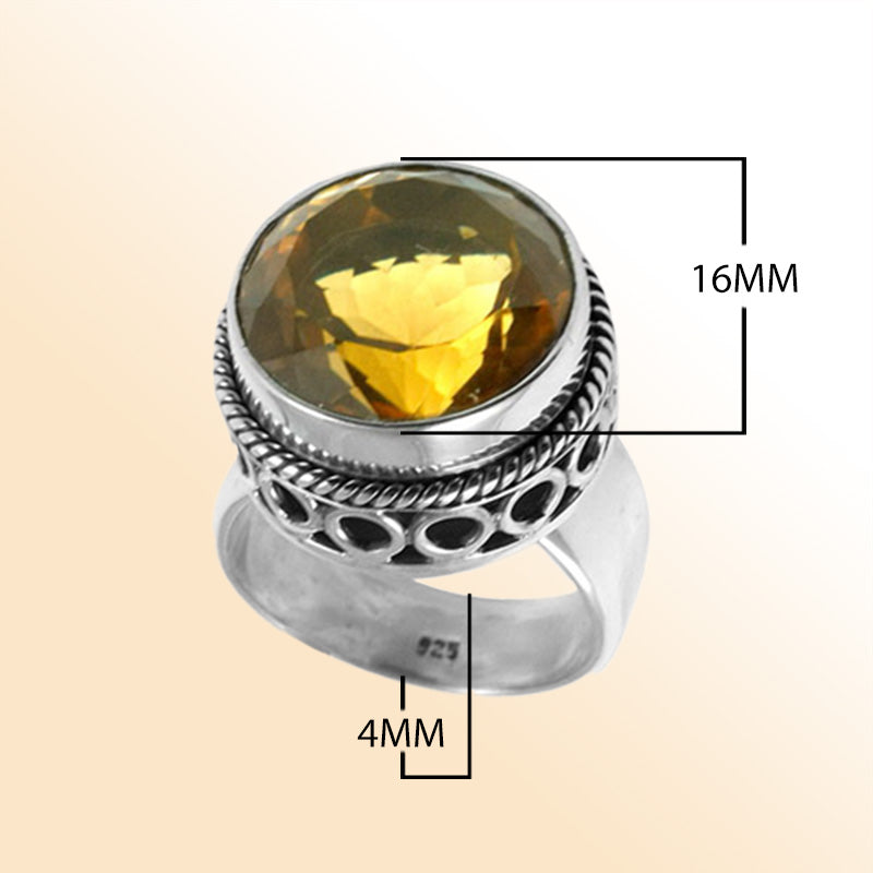Sterling silver citrine ring with a faceted golden Quartz, rope bezel, and cutout band design, handcrafted in Bali for a bold artisan look.