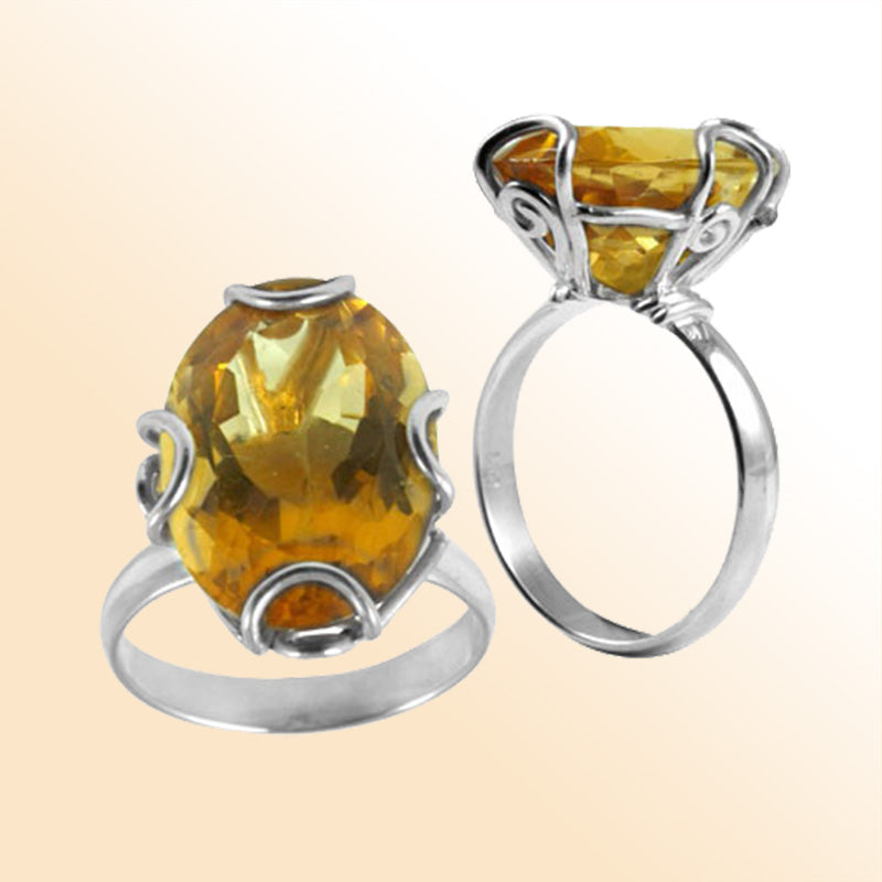 Sterling silver ring with faceted oval Citrine Quartz in scroll prong setting – handcrafted Balinese cocktail jewelry.