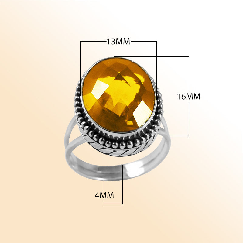 Sterling silver ring with faceted oval Citrine Quartz and Balinese bead details – handcrafted artisan cocktail jewelry.