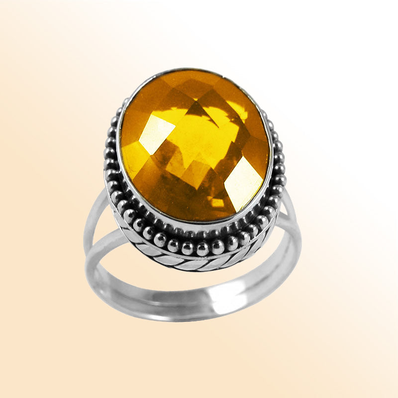Sterling silver ring with faceted oval Citrine Quartz and Balinese bead details – handcrafted artisan cocktail jewelry.