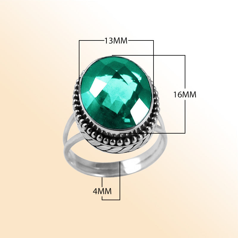 Sterling silver ring with faceted oval Green Quartz and Balinese bead details – handcrafted artisan cocktail jewelry.