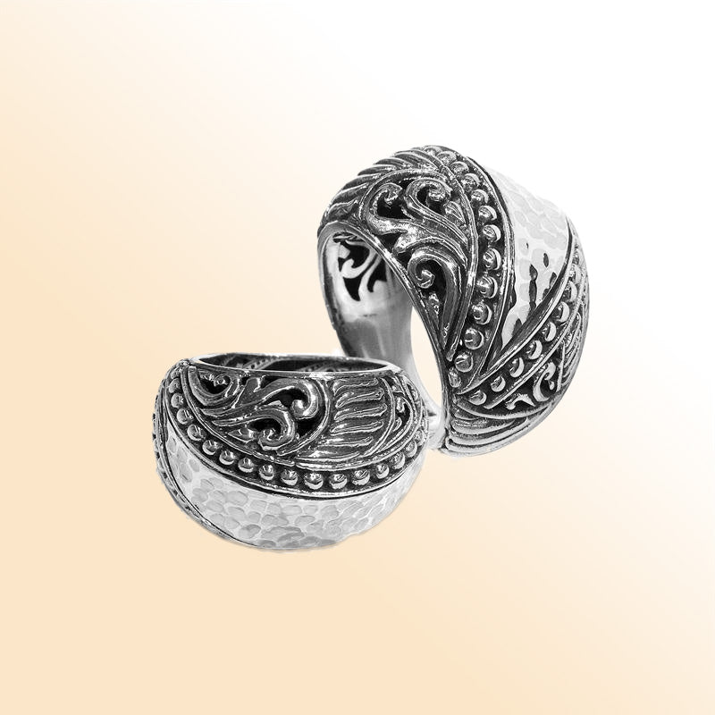 Handcrafted Balinese silver dome ring with hammered texture and scroll accents – unisex statement jewelry.