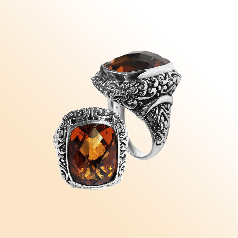 Handcrafted Balinese silver ring with cushion-cut Citrine Quartz and ornate scroll design – bold statement jewelry.
