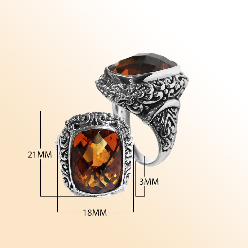Handcrafted Balinese silver ring with cushion-cut Citrine Quartz and ornate scroll design – bold statement jewelry.