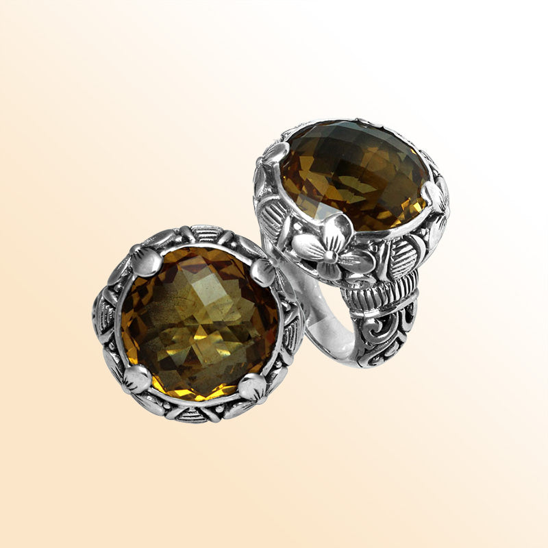 Handcrafted Bali silver ring with round Citrine Quartz and detailed floral carvings.