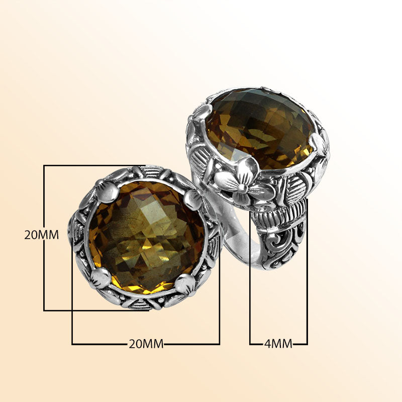 Handcrafted Bali silver ring with round Citrine Quartz and detailed floral carvings.