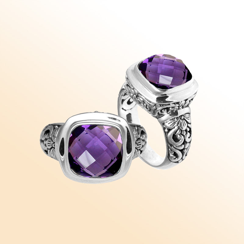 Handcrafted Bali silver ring with cushion-cut Amethyst Quartz and floral carvings.