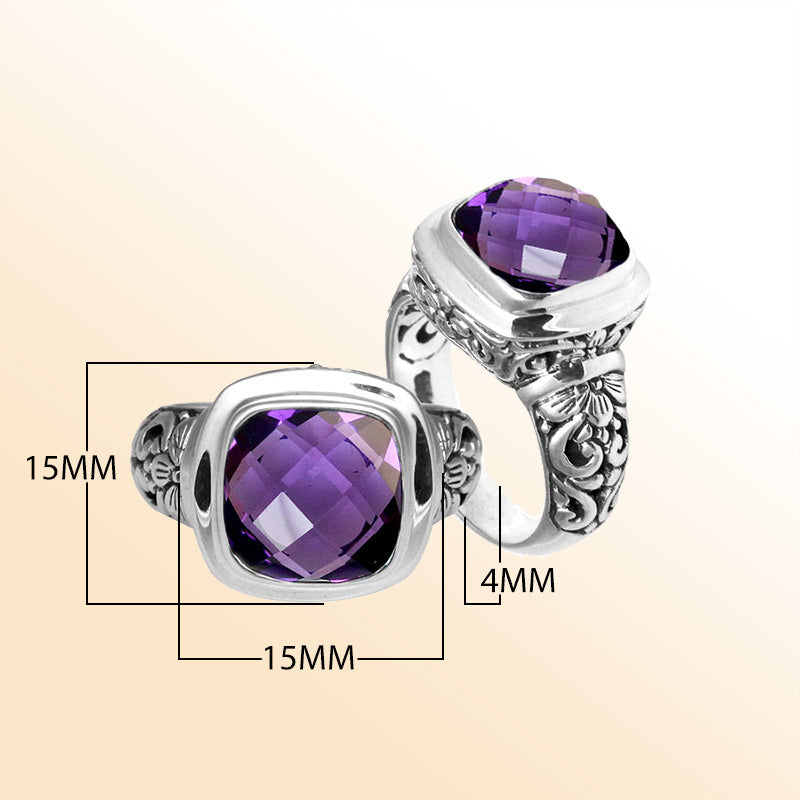 Handcrafted Bali silver ring with cushion-cut Amethyst Quartz and floral carvings.