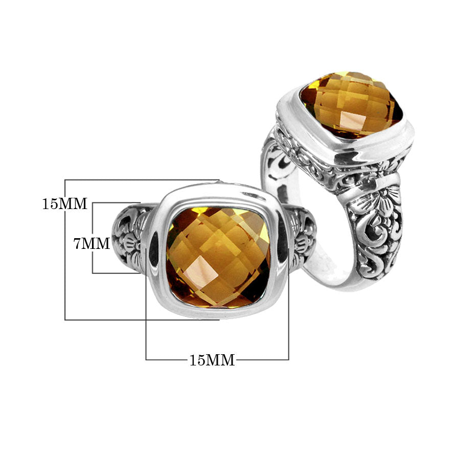Handcrafted Bali silver ring with cushion-cut Citrine Quartz and artisan carvings.