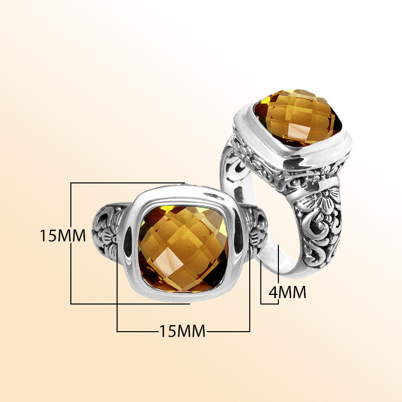 Handcrafted Bali silver ring with cushion-cut Citrine Quartz and artisan carvings.