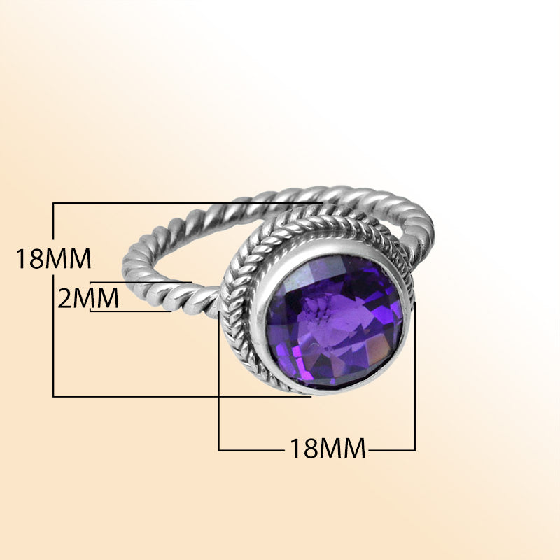 Handcrafted Bali silver ring with round Amethyst Quartz and rope-style band.