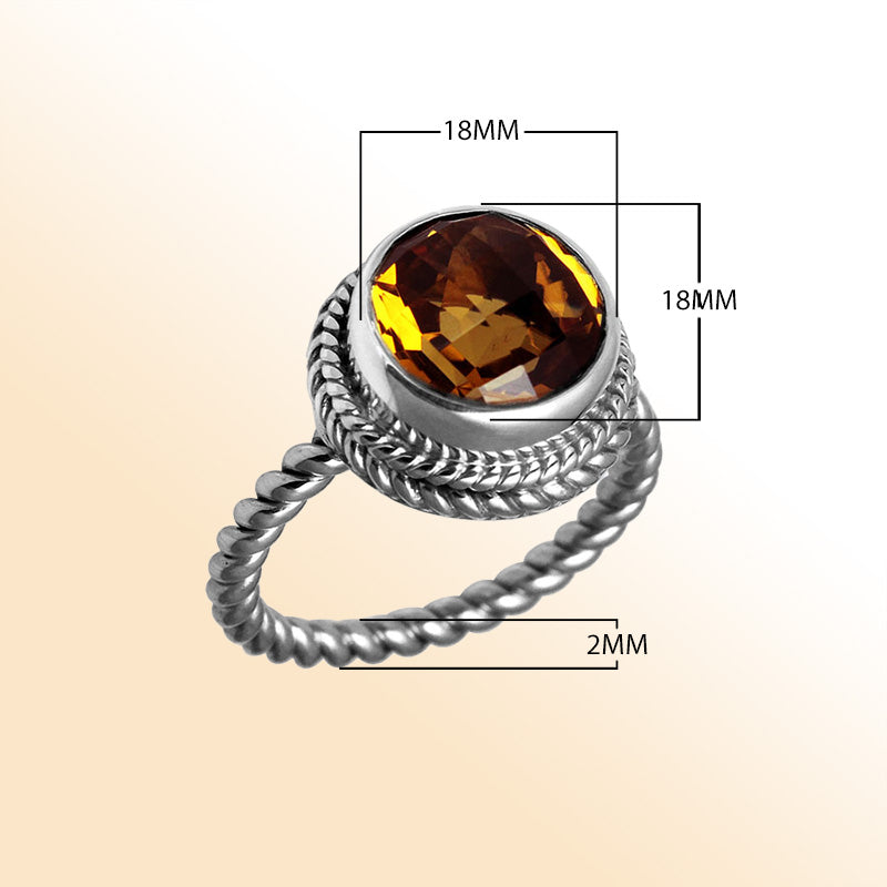 Handcrafted Bali silver ring with round Citrine Quartz and rope-style band.