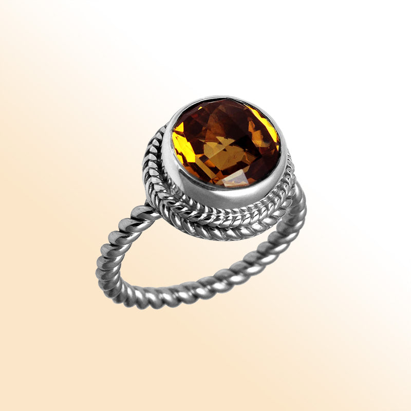 Handcrafted Bali silver ring with round Citrine Quartz and rope-style band.