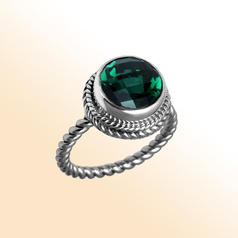 Handcrafted Bali silver ring with round Green Quartz and rope-style band.