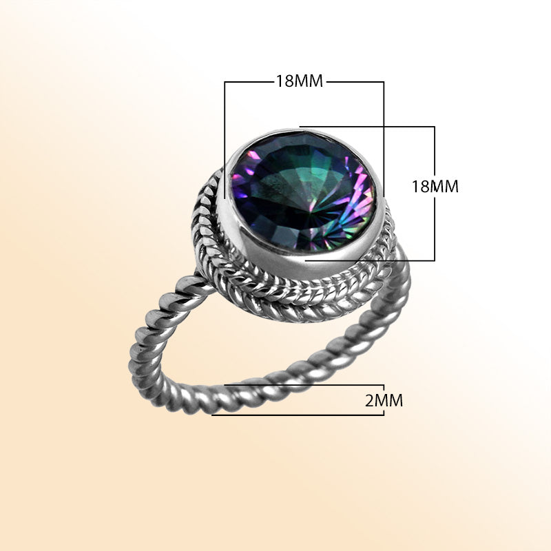 Handcrafted Bali silver ring with a round Mystic Topaz Quartz and rope-style band.