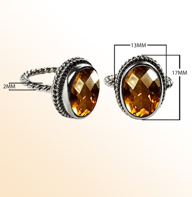 Handcrafted sterling silver Citrine Quartz ring with oval faceted Quartz and rope bezel, artisan jewelry from Indonesia.