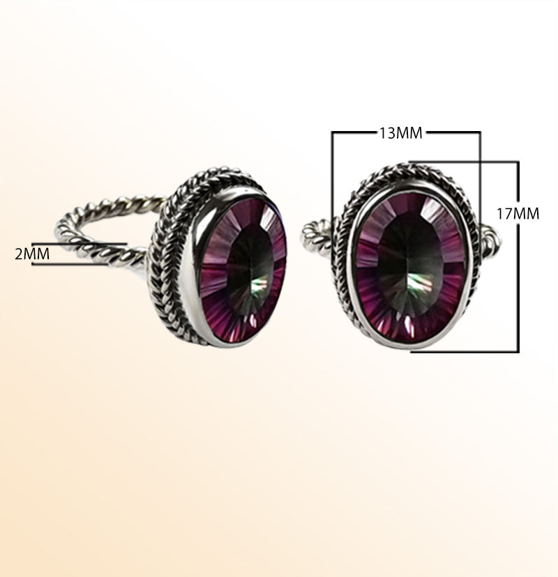 Handcrafted sterling silver Mystic Quartz ring with oval faceted multicolor Quartz and rope bezel, artisan jewelry from Indonesia.