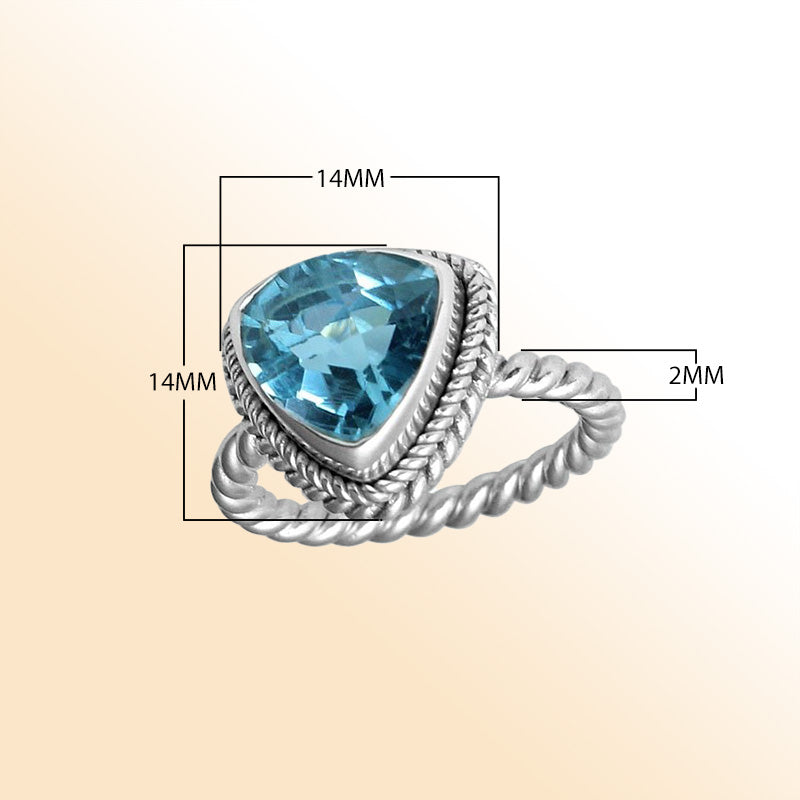 Handcrafted sterling silver Blue Topaz Quartz ring with faceted trillion-cut Quartz and rope bezel, artisan jewelry from Indonesia.