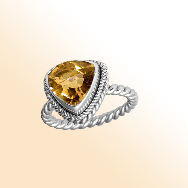 Handcrafted sterling silver Citrine Quartz ring with faceted trillion Yellow Quartz and rope bezel, artisan jewelry from Indonesia.