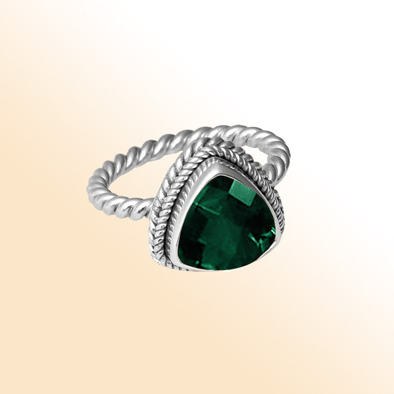 Handmade Bali silver ring with Green Quartz and twisted rope band, artisan design.