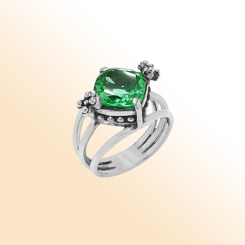 Handmade sterling silver Green Quartz ring with floral details and split shank, artisan Bali jewelry.