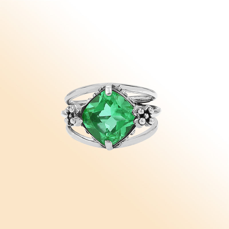 Handmade sterling silver Green Quartz ring with floral details and split shank, artisan Bali jewelry.