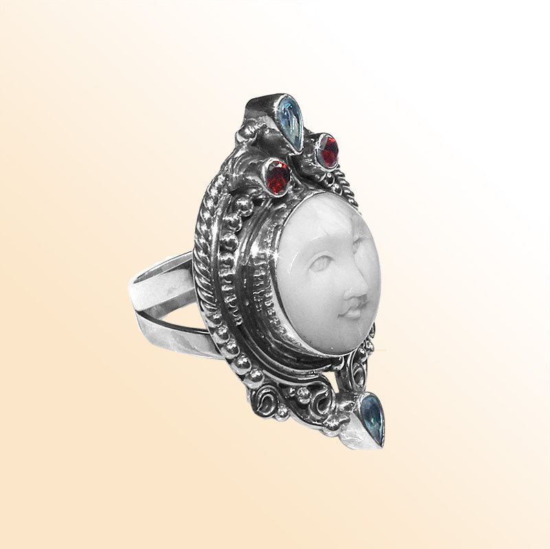 Handmade sterling silver Carved Shell Face Ring with Quartz accents, Balinese artisan jewelry.