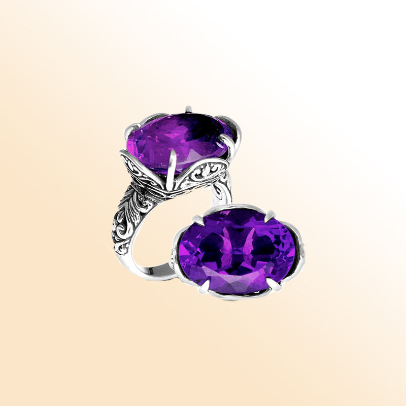 Handcrafted sterling silver Bali ring with oval purple Amethyst Quartz and scrollwork.