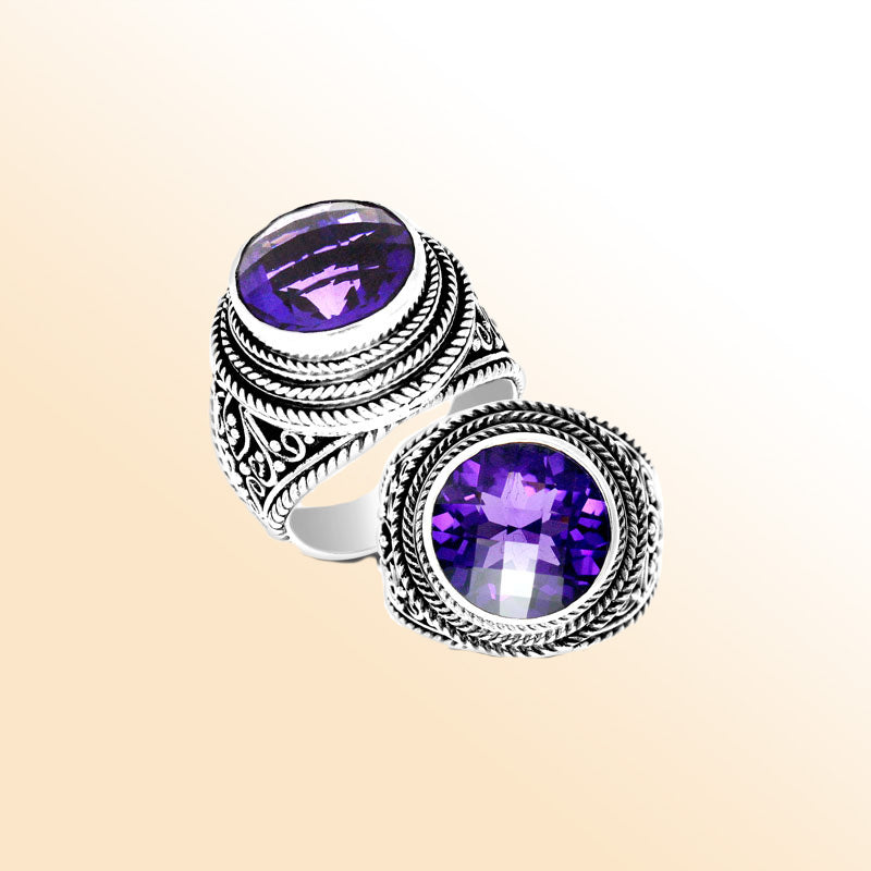 Handcrafted sterling silver Bali ring with round purple Amethyst Quartz and rope scroll detailing.