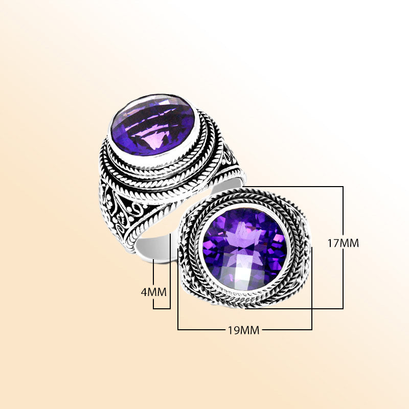 Handcrafted sterling silver Bali ring with round purple Amethyst Quartz and rope scroll detailing.