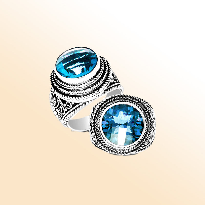 Handcrafted sterling silver Bali ring with round Blue Topaz Quartz and detailed rope scrollwork.