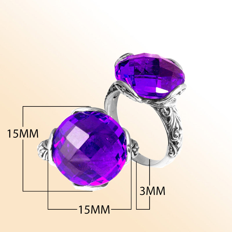 Handcrafted sterling silver Bali ring with faceted round Amethyst Quartz and scroll-carved band.