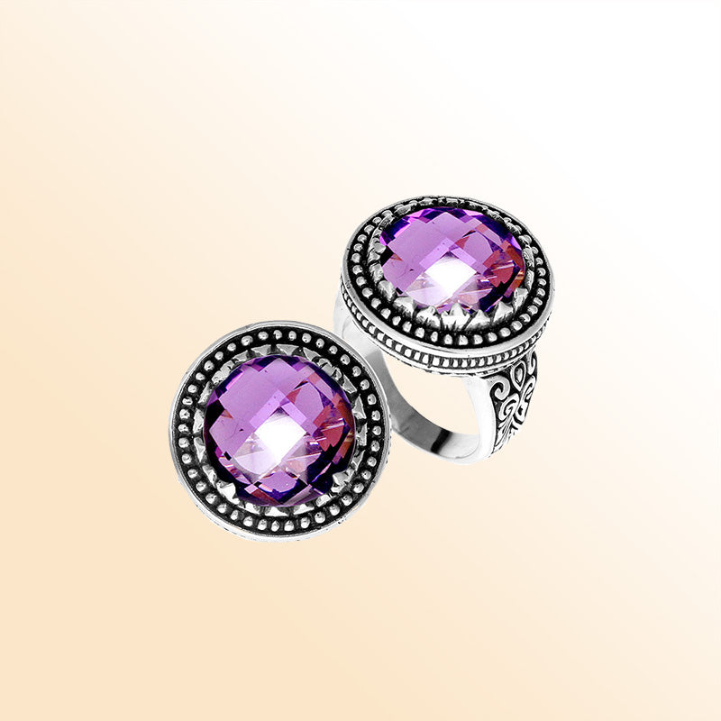 Handcrafted Bali sterling silver ring with faceted Amethyst Quartz and beaded halo design.