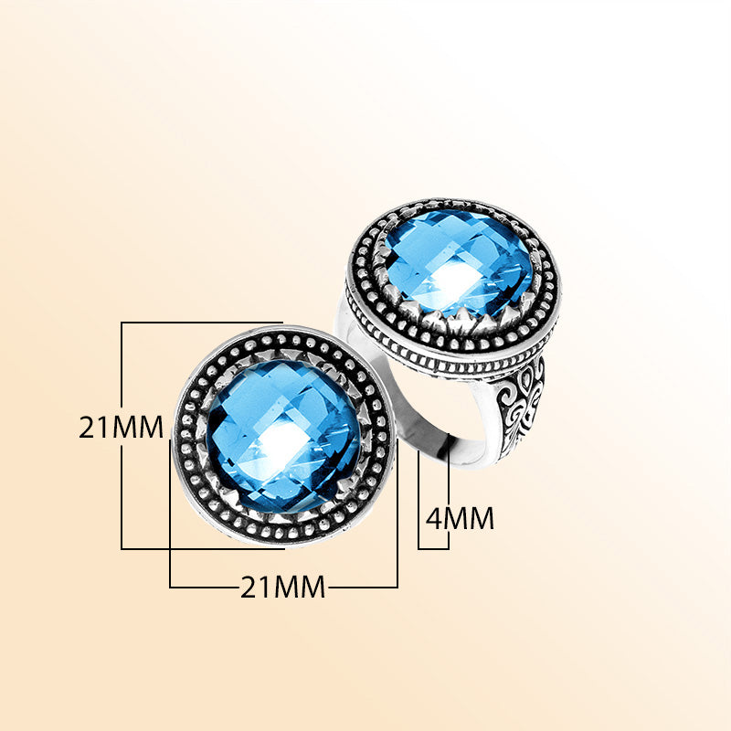 Handcrafted sterling silver Bali ring with faceted Blue Topaz Quartz and beaded halo design.