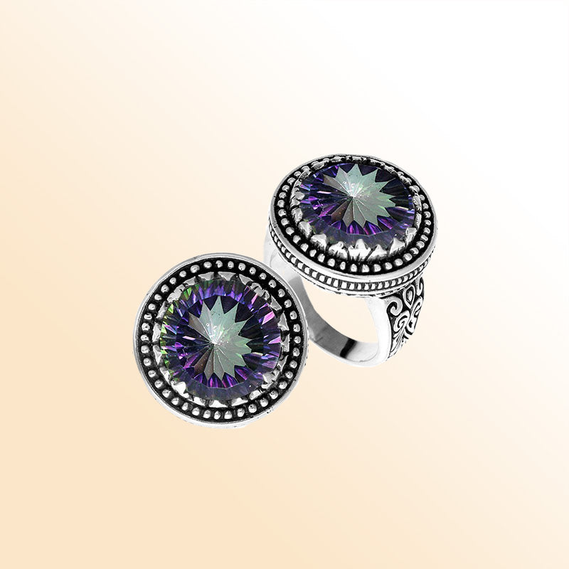 Handcrafted sterling silver Bali ring with Mystic Quartz and beaded halo design.