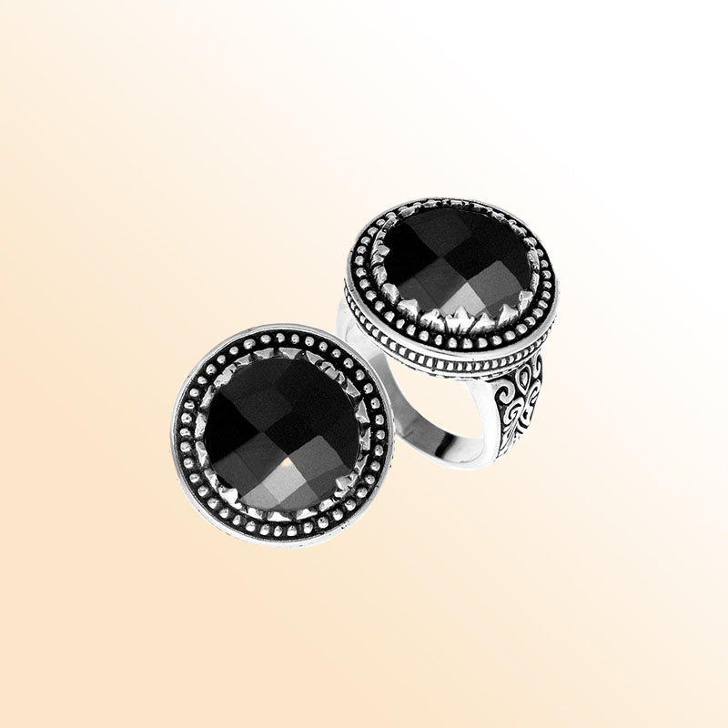 Handcrafted sterling silver Bali ring with faceted Black Onyx and beaded halo design.