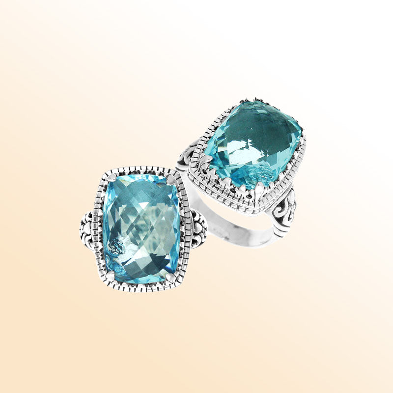 Handmade sterling silver Balinese ring with cushion-cut Blue Topaz Quartz.