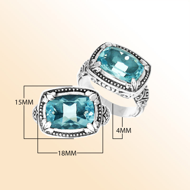 Handmade sterling silver Balinese ring with cushion-cut Blue Topaz Quartz and beadwork details.