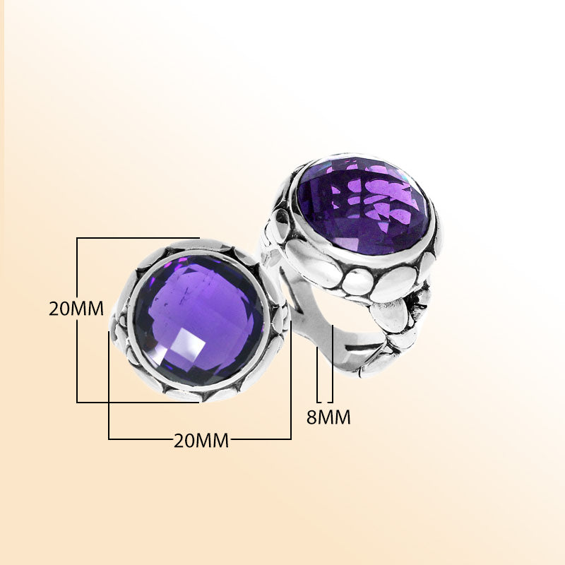 Handmade sterling silver Balinese ring with round-cut Amethyst Quartz in a bold bezel design.