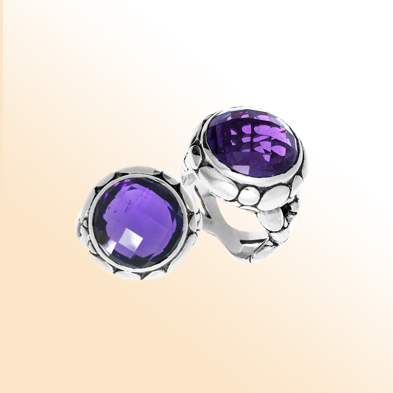 Handmade sterling silver Balinese ring with round-cut Amethyst Quartz in a bold bezel design.
