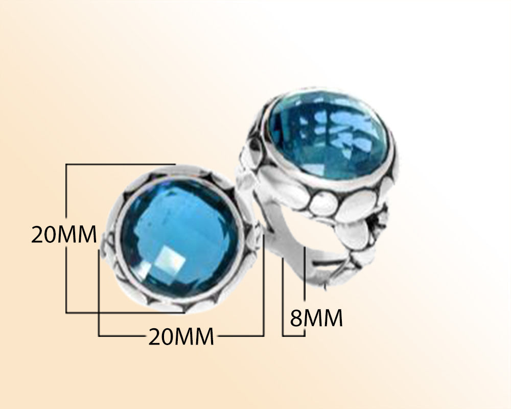 Handmade sterling silver Balinese ring with round-cut Blue Topaz Quartz in a bold bezel.