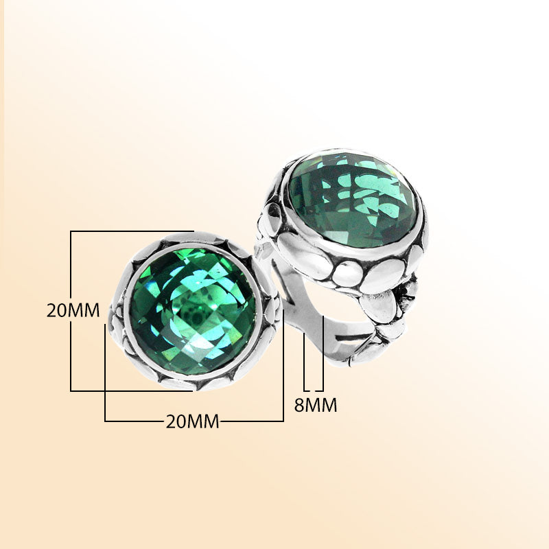 Handmade sterling silver Balinese ring with round faceted Green Quartz in a bold bezel.