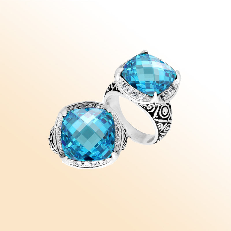 Handmade sterling silver Balinese ring with cushion-cut Blue Topaz Quartz in vivid aqua tones.