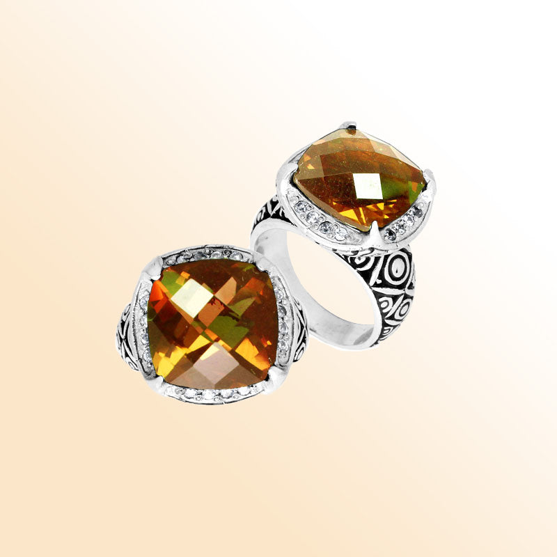 Handmade sterling silver Balinese ring with cushion-cut Citrine Quartz in warm golden tones.